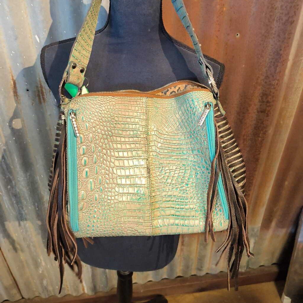 Shoulder bag-cow hide and fringe