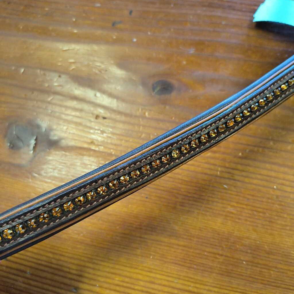 raised brown bling