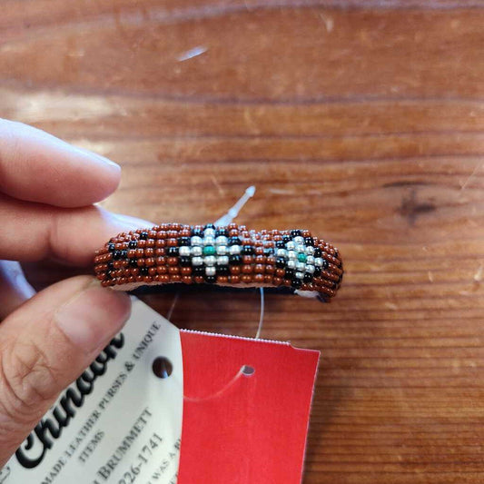 Leather wraped hair tie with beading