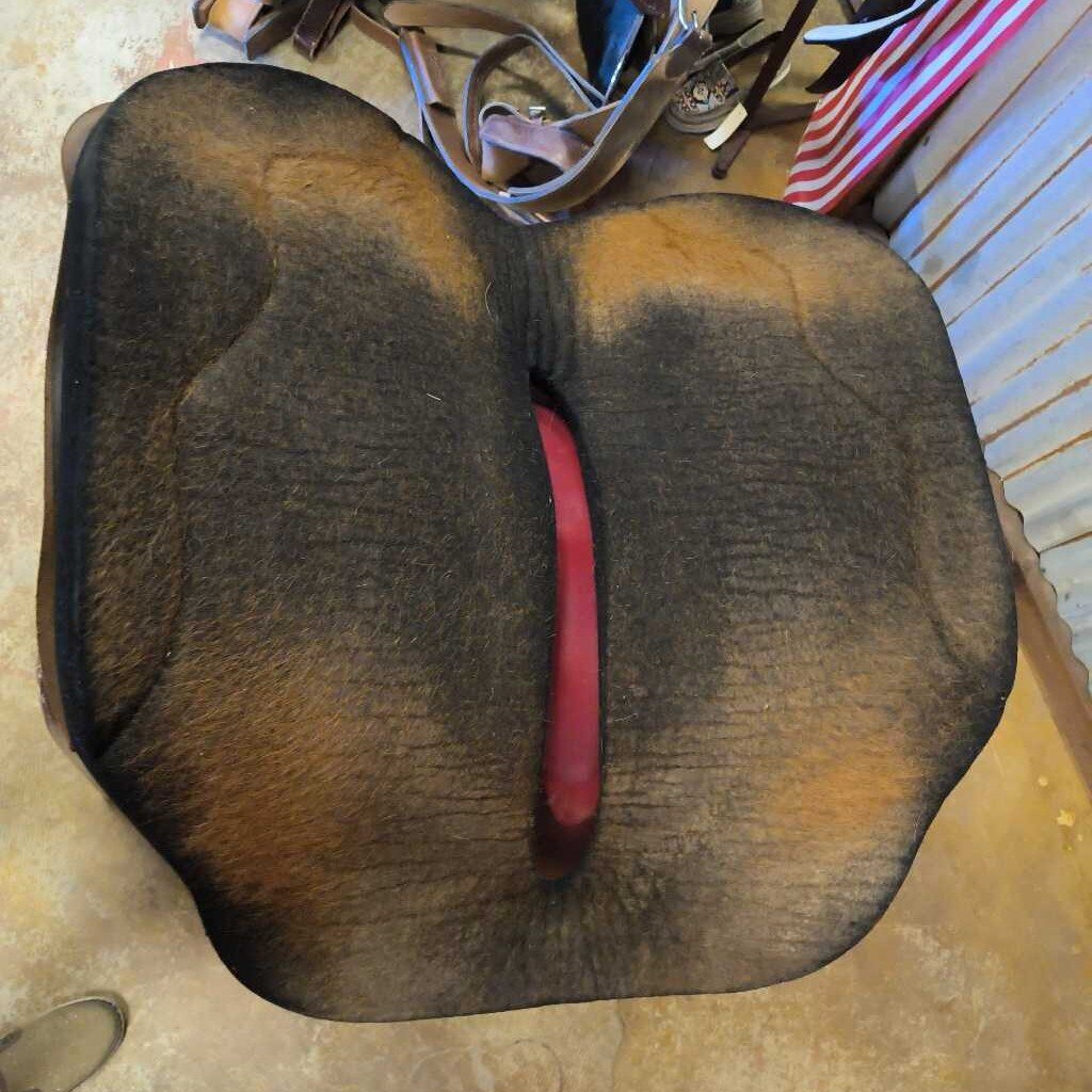 Open spine round pad