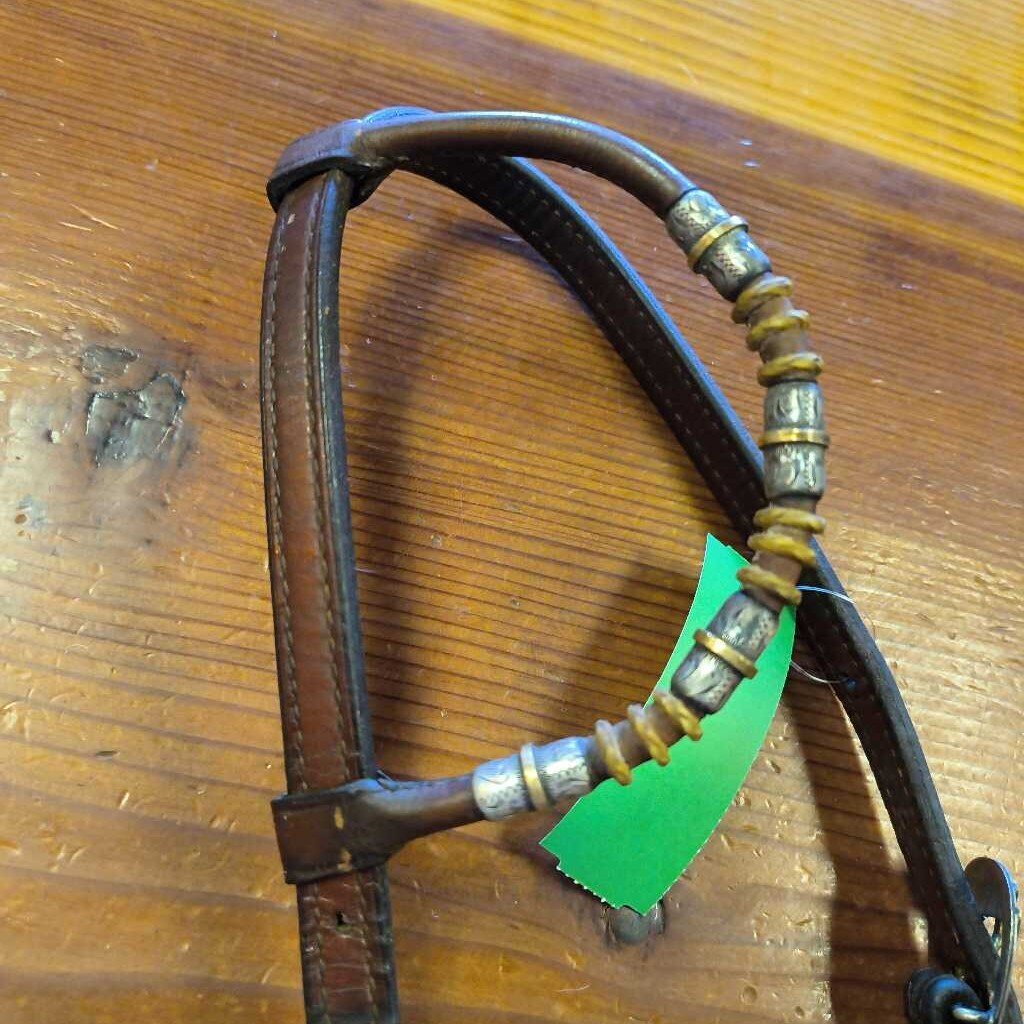 Single ear, Sterling silver and rawhide detail
