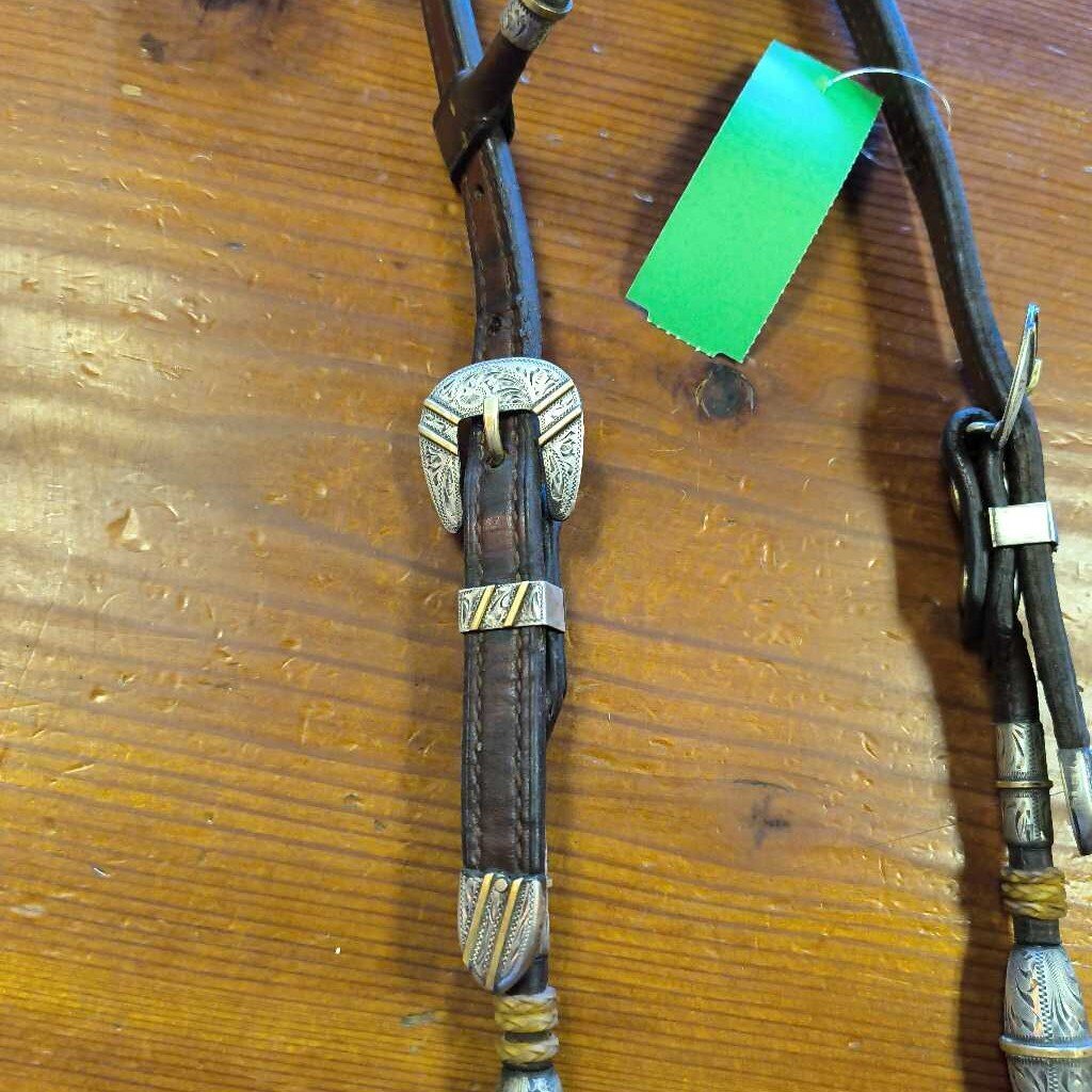 Single ear, Sterling silver and rawhide detail