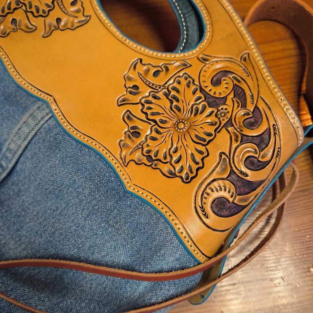 Jean and leather tooled