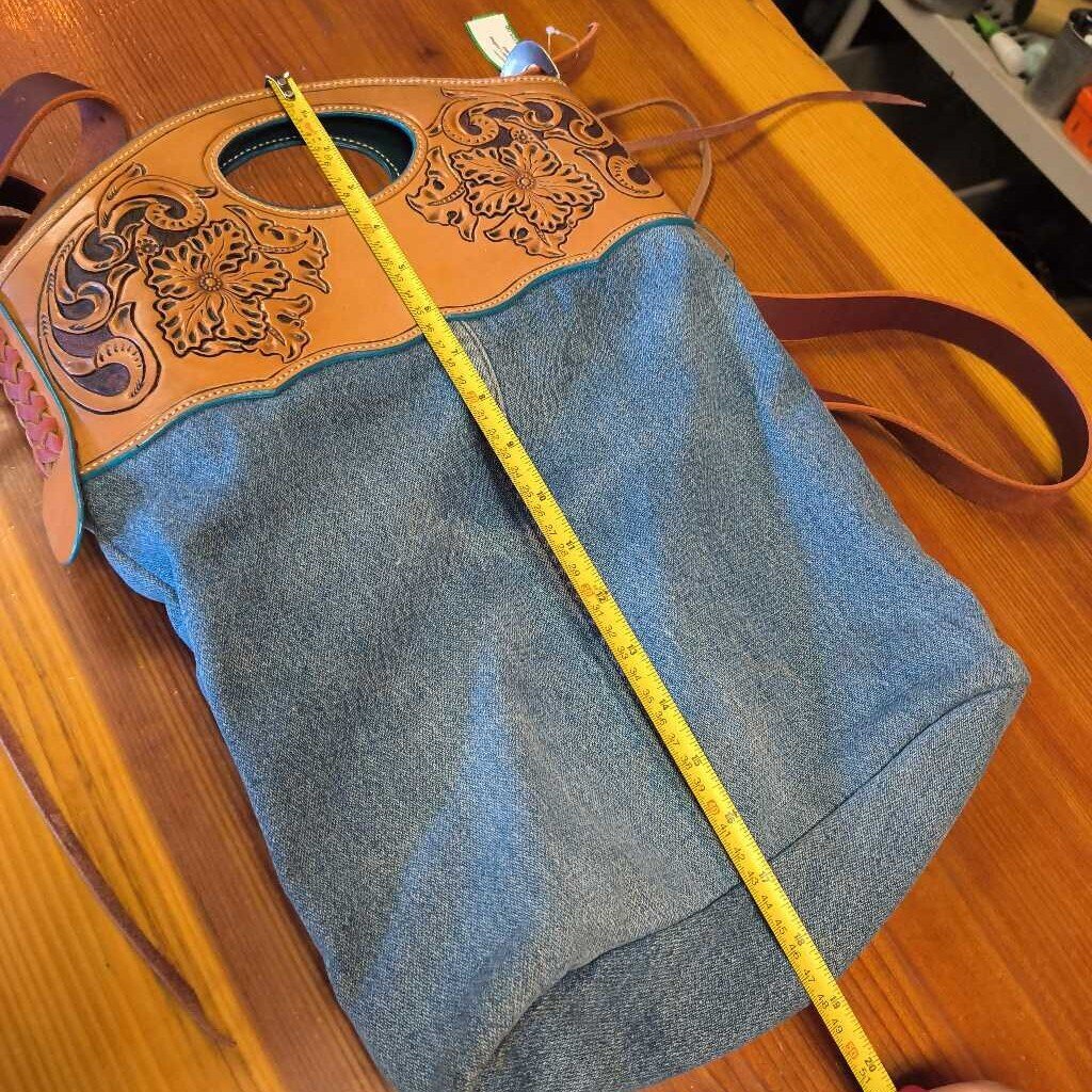 Jean and leather tooled