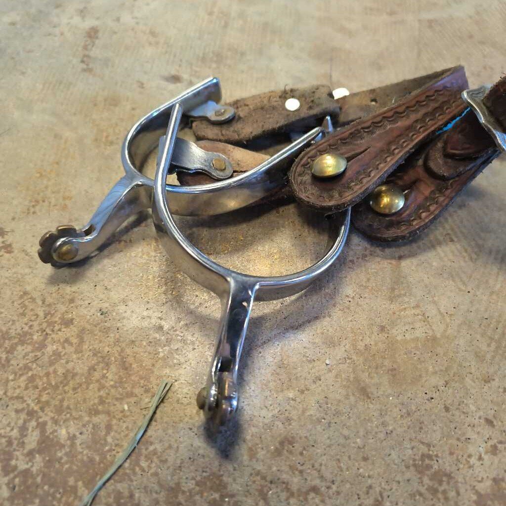 Spurs and leather straps