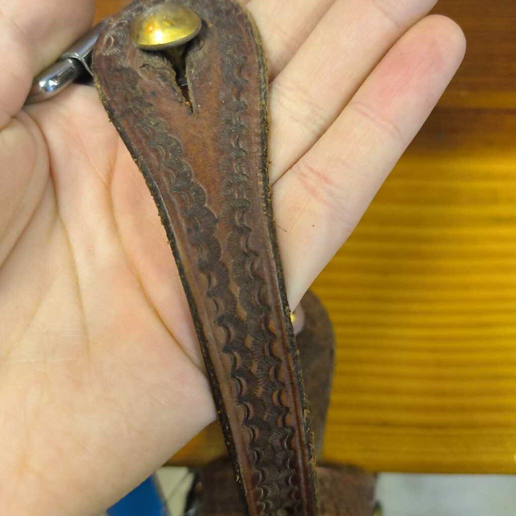 Spurs and leather straps