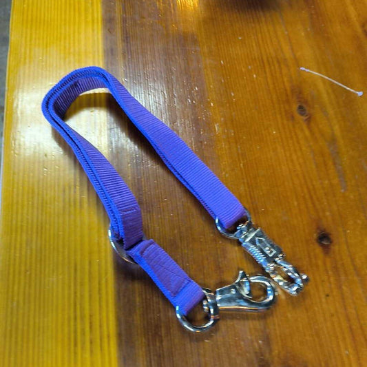 Adjustable nylon- trailer tie with quick panic snap