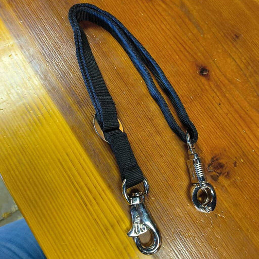 Adjustable nylon- trailer tie with quick panic snap